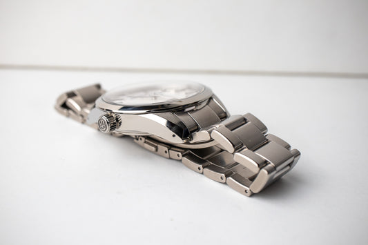 Grand Seiko SBGA147 titanium men's watch bottom right side of the casevcand lug with the crown that says GS on it