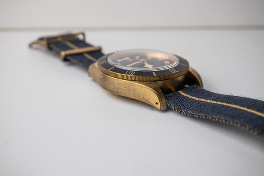 Tudor Black Bay Bronze Bucherer Blue dial reference 79250BB bottom left side of case an lug with crown