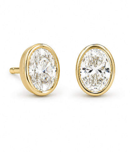 14k Yellow Gold 1.06tcw Oval Lab Grown Diamond Bezel Set Stud Earrings
