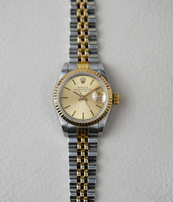 Rolex Oyster Perpetual Date 69173 Champagne Dial