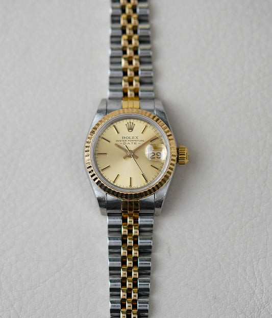 Rolex Oyster Perpetual Date 69173 Champagne Dial