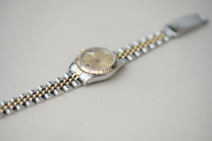 Rolex Oyster Perpetual Date 69173 Champagne Dial