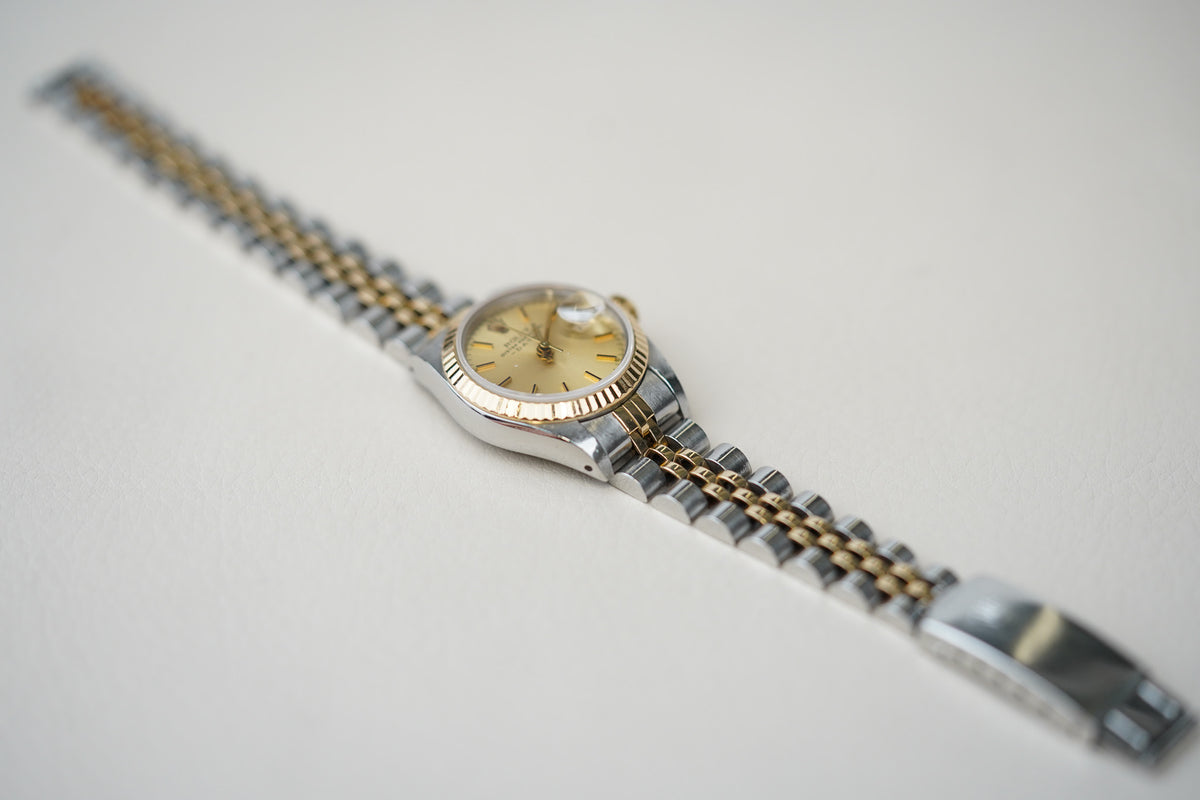 Rolex Oyster Perpetual Date 69173 Champagne Dial
