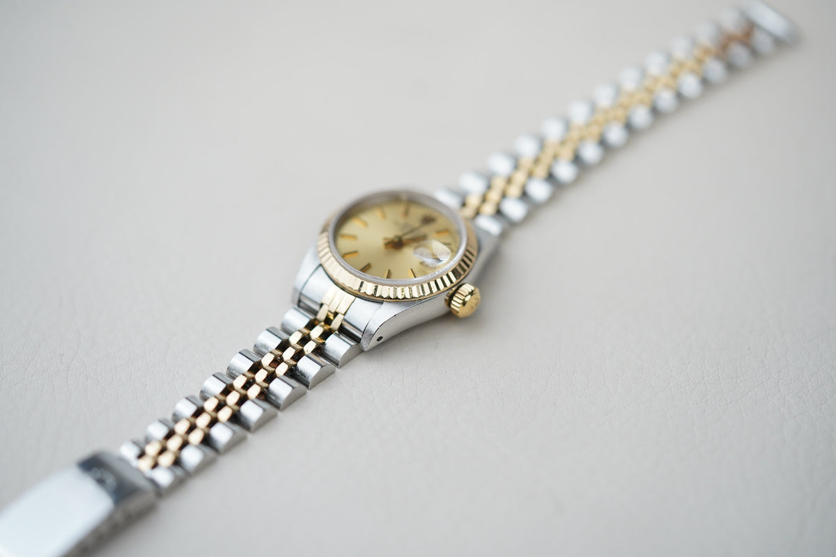 Rolex Oyster Perpetual Date 69173 Champagne Dial