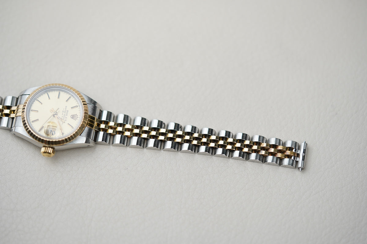 Rolex Oyster Perpetual Date 69173 Champagne Dial
