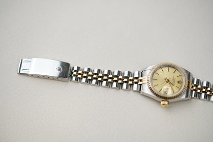 Rolex Oyster Perpetual Date 69173 Champagne Dial