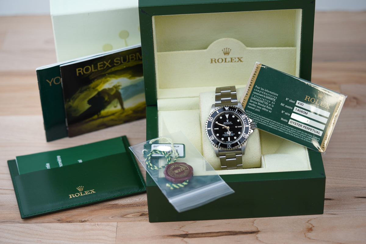 Rolex Submariner 14060M 'Scrambled Engraved' 4-Liner