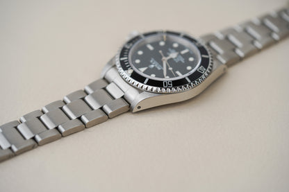 Rolex Submariner 14060M 'Scrambled Engraved' 4-Liner