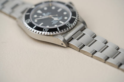 Rolex Submariner 14060M 'Scrambled Engraved' 4-Liner