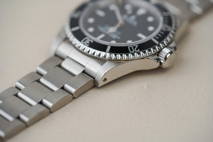 Rolex Submariner 14060M 'Scrambled Engraved' 4-Liner
