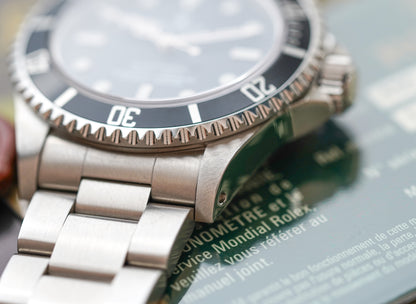 Rolex Submariner 14060M 'Scrambled Engraved' 4-Liner